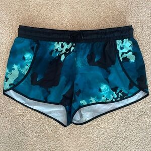 Fabletics green & black print short athletic shorts, women’s size Small